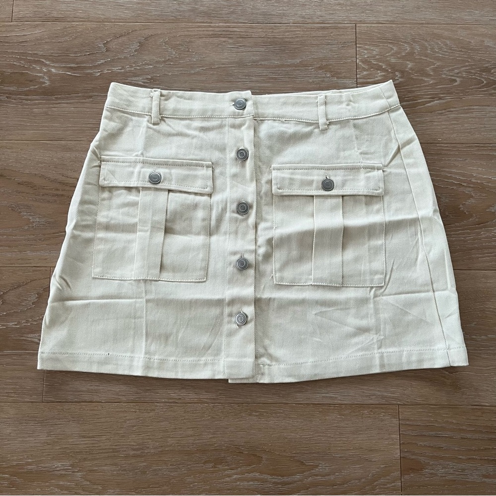 NWT Francesca’s white jean mini skirt